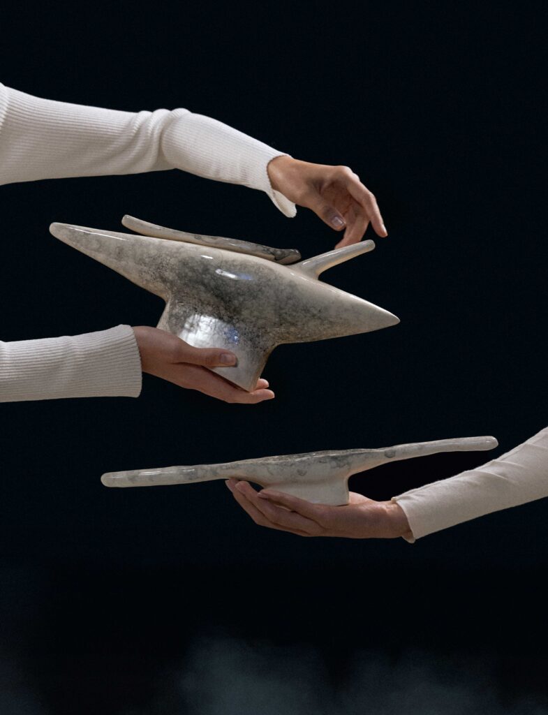 DYKA ceramic bowls and vases — hand-sculpted from white clay with textured glazed surfaces